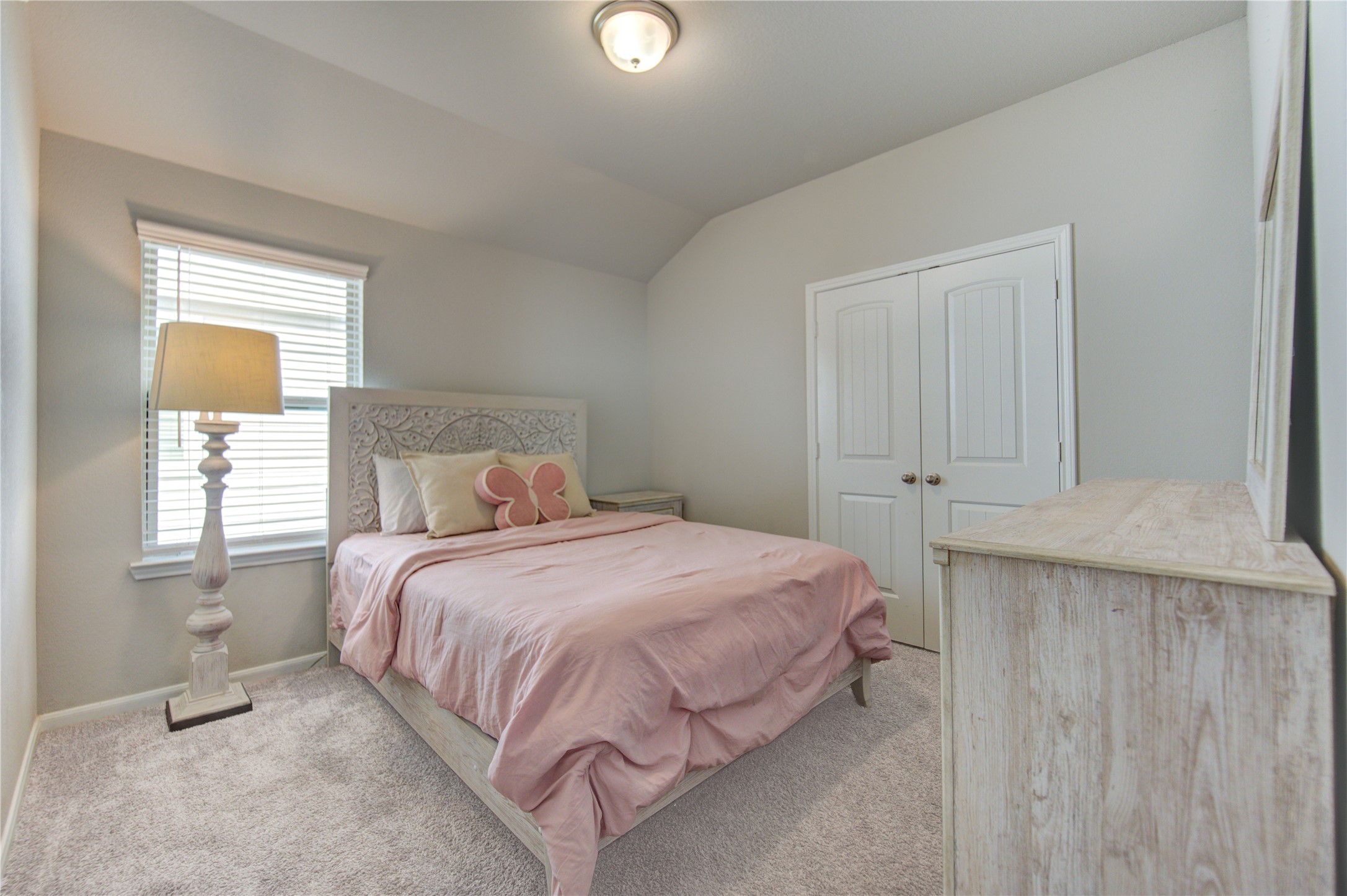 5011 Yellow Rays Trail Katy, TX 77493 - Photo 33 of 47 a bedroom with a bed and a window