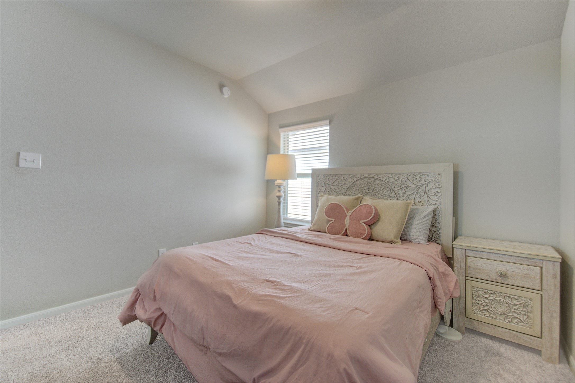 5011 Yellow Rays Trail Katy, TX 77493 - Photo 34 of 47 a large bed sitting in a bedroom next to a window