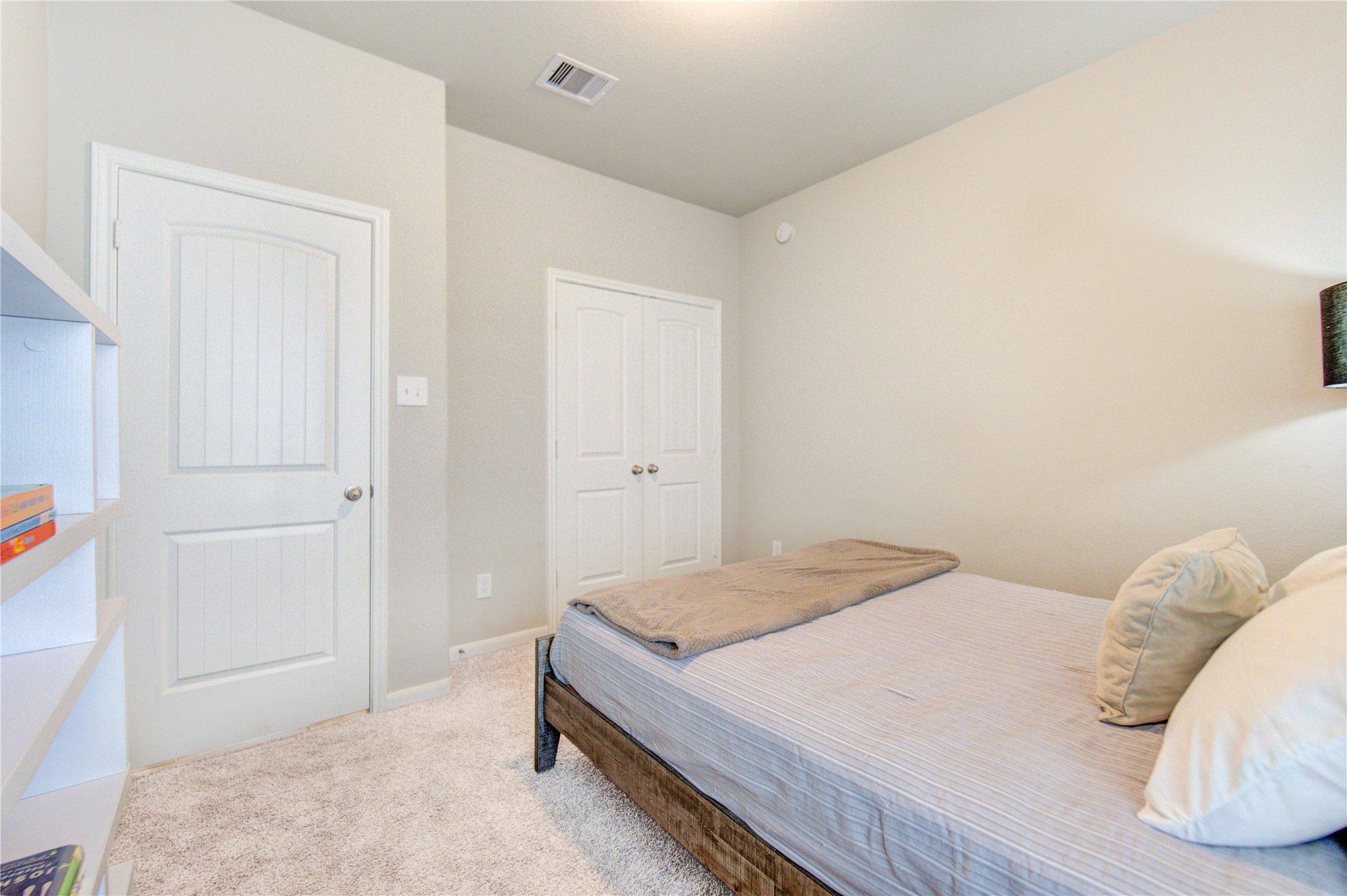 5011 Yellow Rays Trail Katy, TX 77493 - Photo 36 of 47 a bedroom with a bed and a window