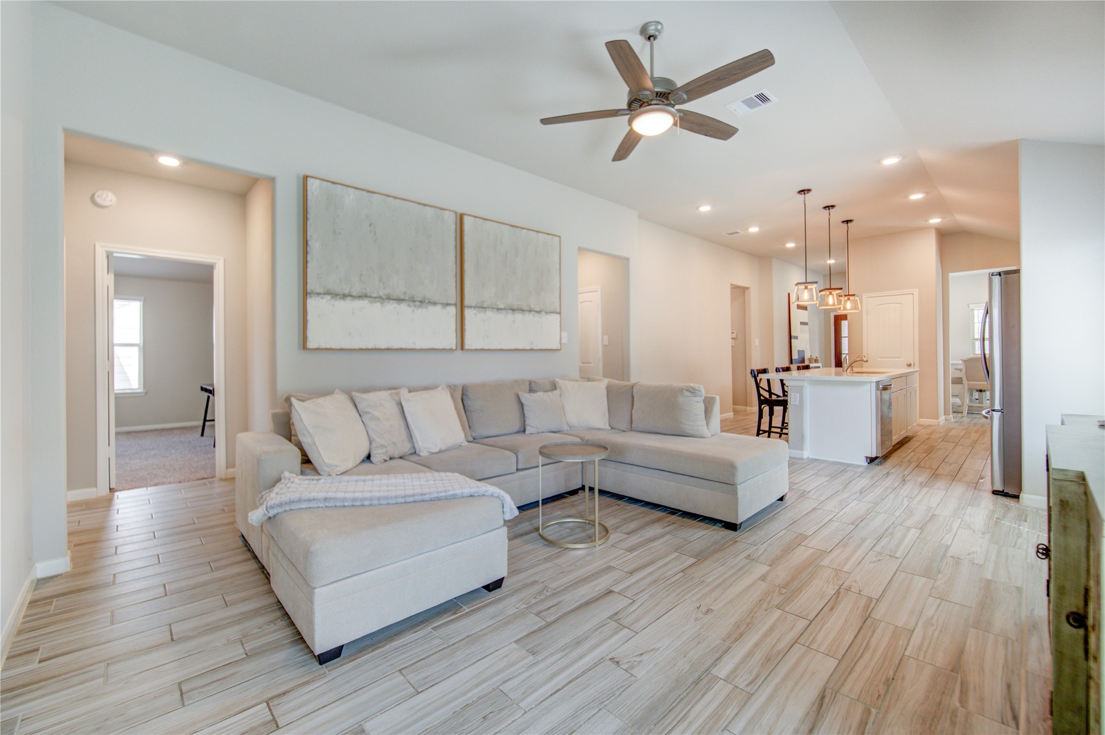 5011 Yellow Rays Trail Katy, TX 77493 - Photo 7 of 47 a living room with furniture and a wooden floor