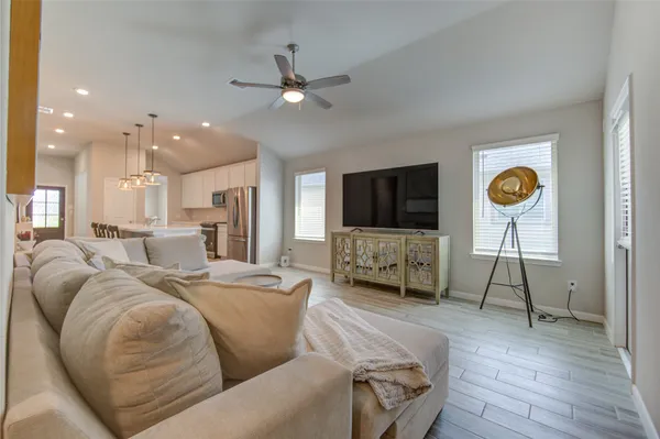 a view of a dining room with furniture and window