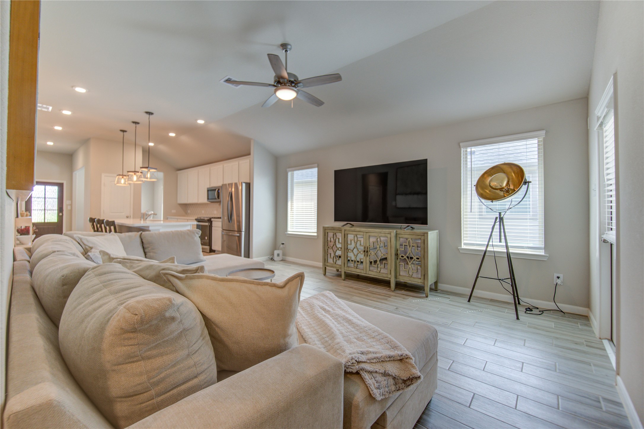 5011 Yellow Rays Trail Katy, TX 77493 - Photo 8 of 47 a living room with furniture and a flat screen tv