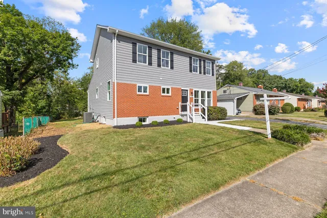 a front view of house with yard