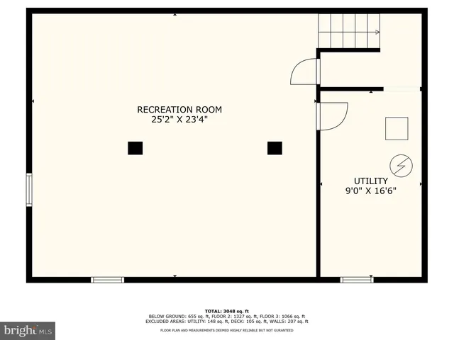 a picture of a bench in front of a wall