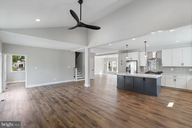 a view of kitchen and windows