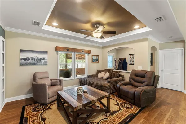 a living room with furniture and a window