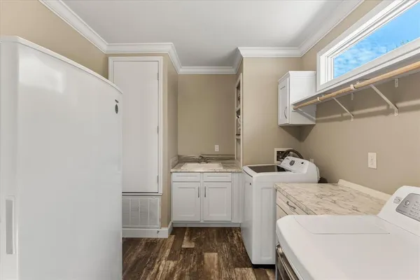 a view of a swimming pool with a patio