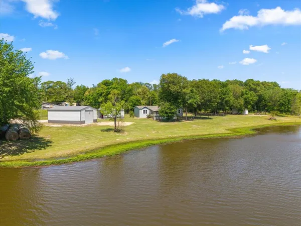 a view of a swimming pool and lake view