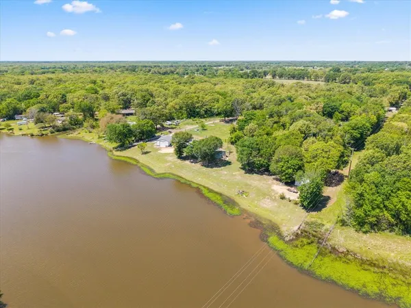 a view of a yard with an outdoor space