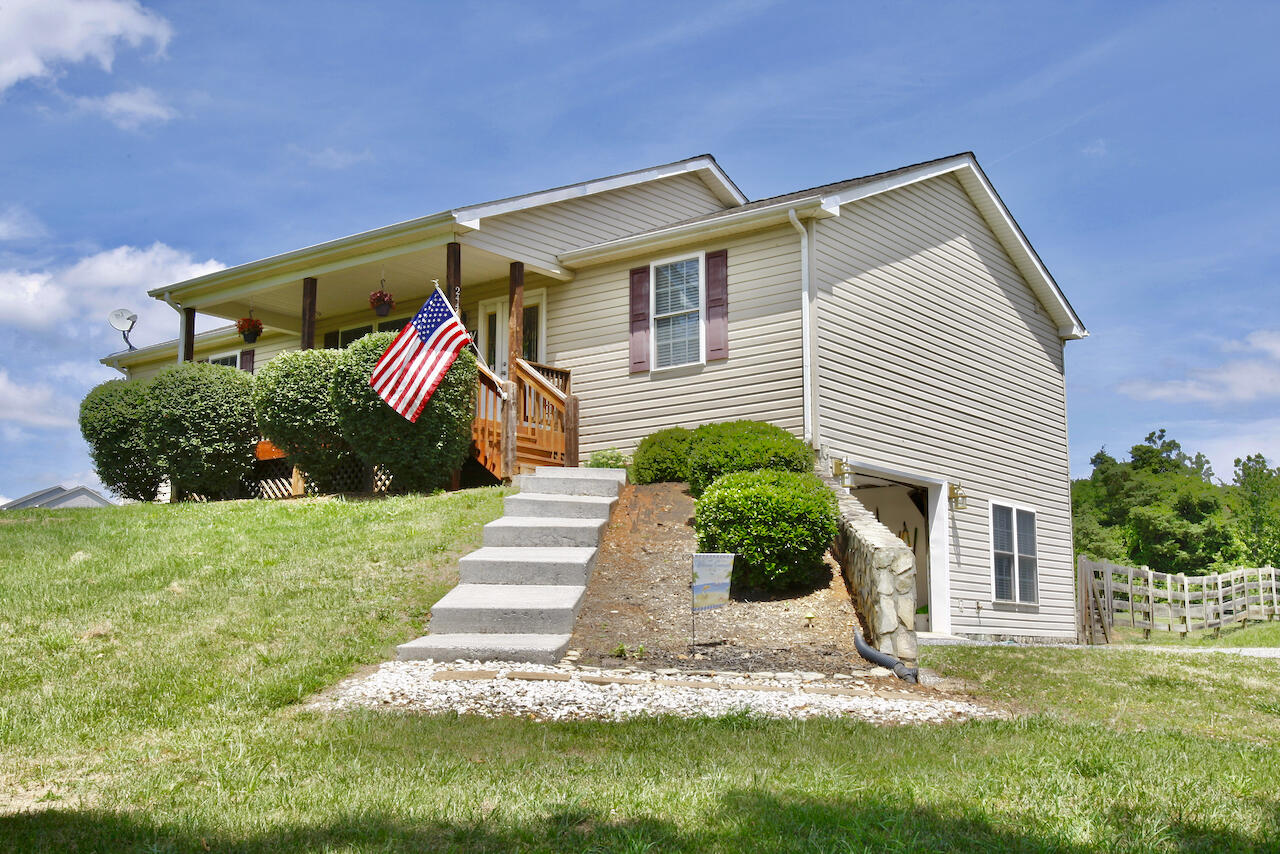 2444 Nemmo Road Vinton, VA 24179 - Photo 1 of 59 a front view of a house with a yard