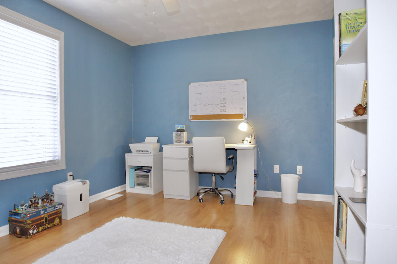 2444 Nemmo Road Vinton, VA 24179 - Photo 19 of 59 a bedroom with furniture and a wooden floor