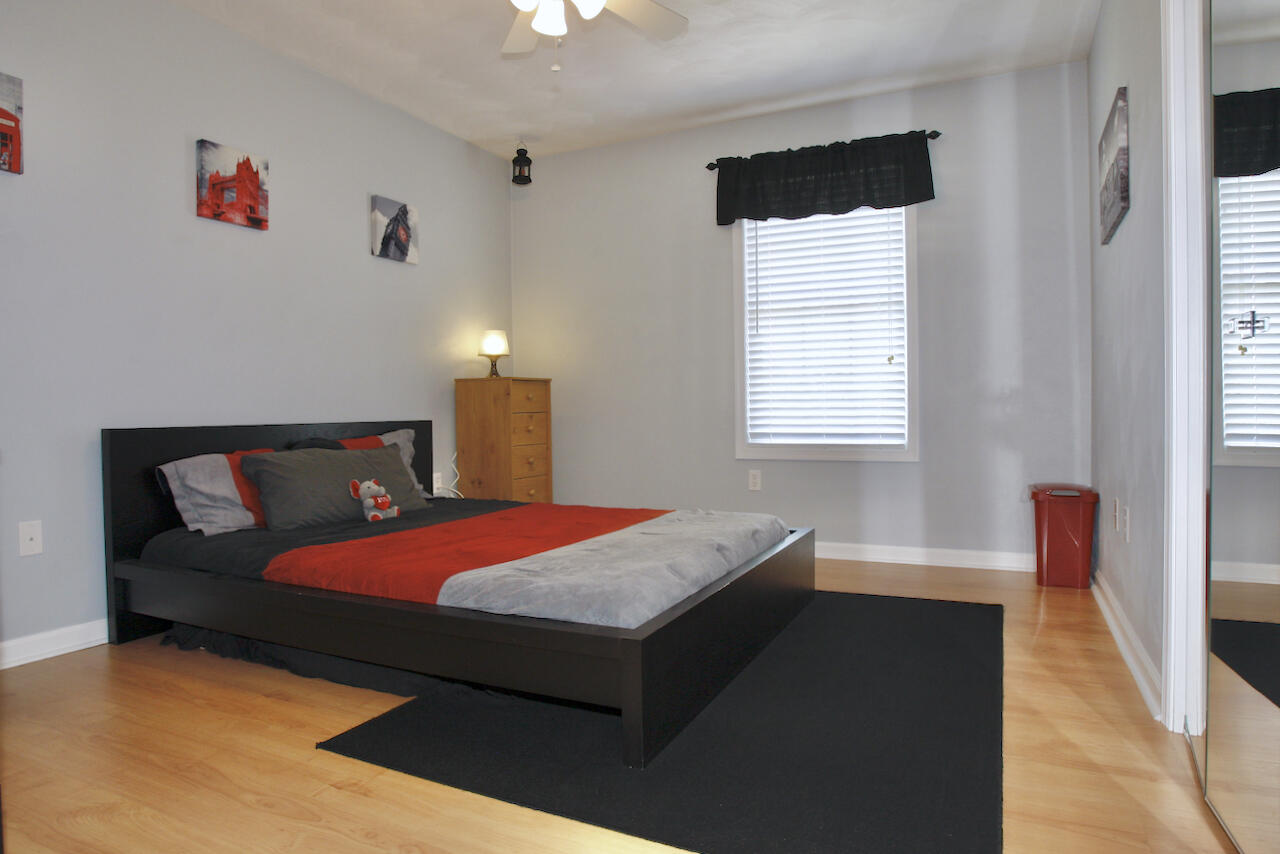 2444 Nemmo Road Vinton, VA 24179 - Photo 21 of 59 a bedroom with a bed and a window