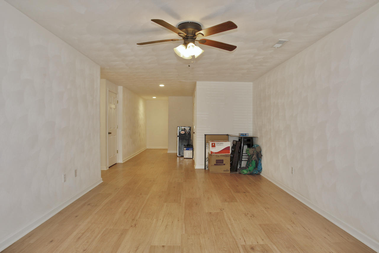 2444 Nemmo Road Vinton, VA 24179 - Photo 28 of 59 wooden floor in an empty room with a window