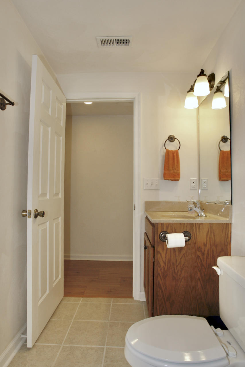 2444 Nemmo Road Vinton, VA 24179 - Photo 29 of 59 a bathroom with a toilet a sink and mirror