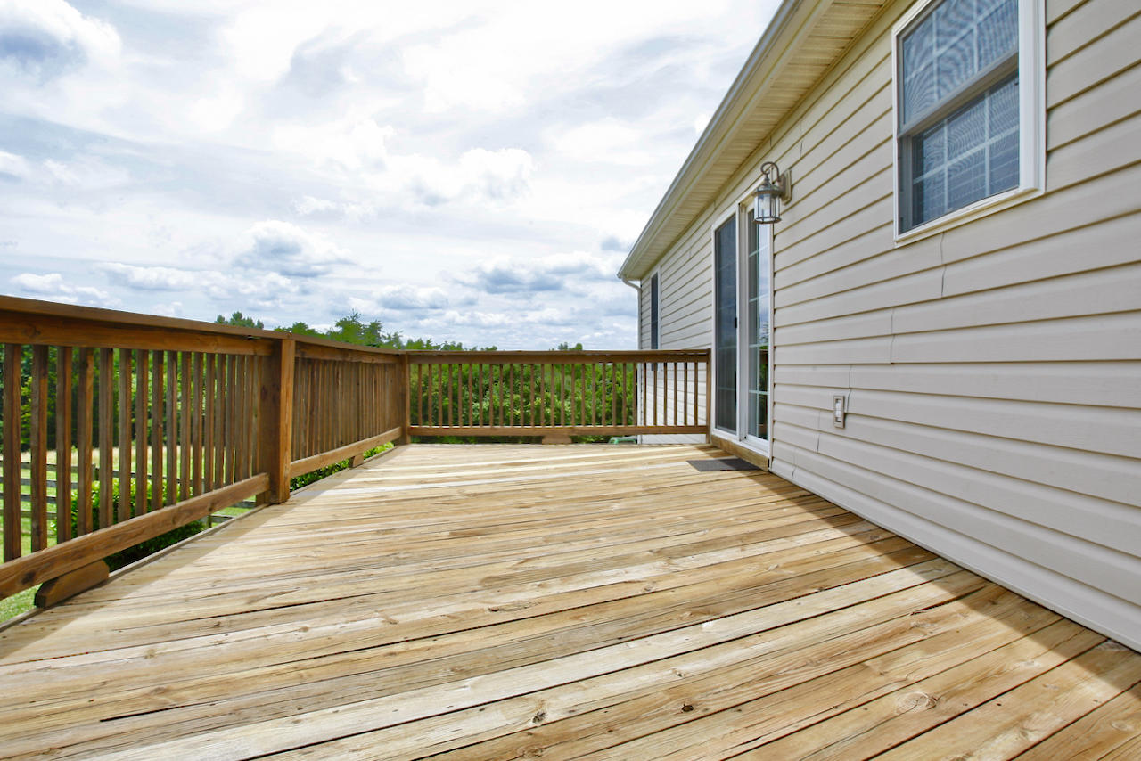 2444 Nemmo Road Vinton, VA 24179 - Photo 37 of 59 a terrace view with wooden floor and fence
