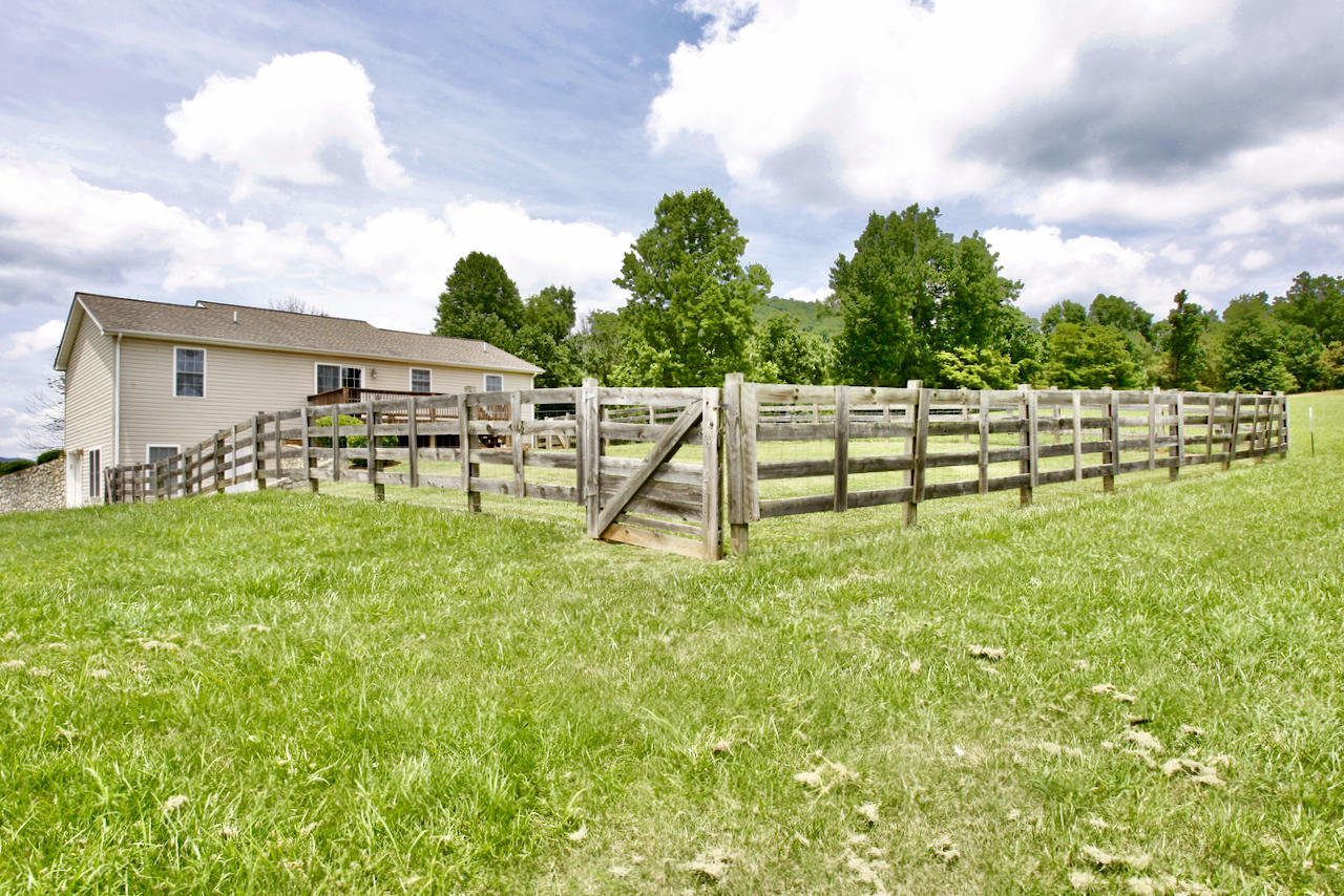 2444 Nemmo Road Vinton, VA 24179 - Photo 43 of 59 a view of a yard with a bench