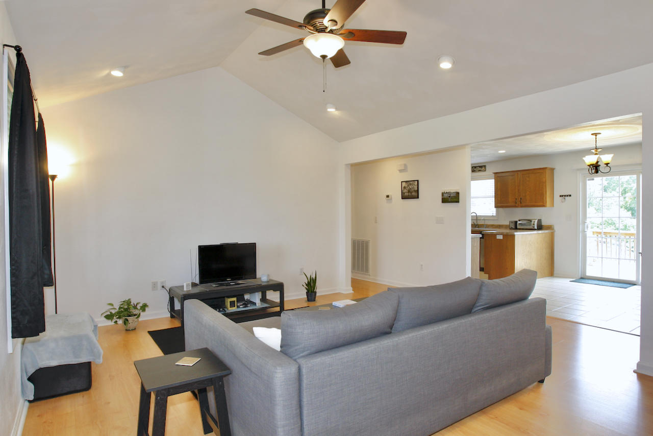 2444 Nemmo Road Vinton, VA 24179 - Photo 9 of 59 a living room with furniture and a view of kitchen
