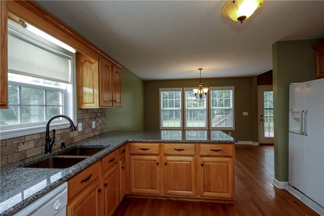 95 Brummitt Road Castalian Springs, TN 37031 - Photo 6 of 16 Another view of kitchen and dining area.