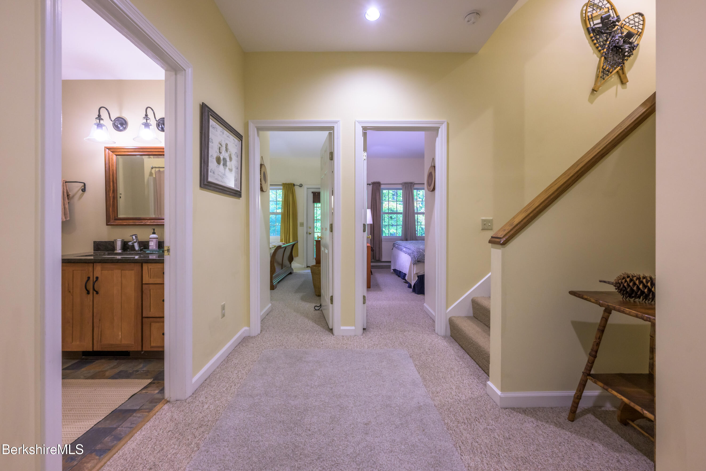 9341 Mountainside Drive Hancock, MA 01237 - Photo 32 of 43 a view of a hallway with bathroom and front door