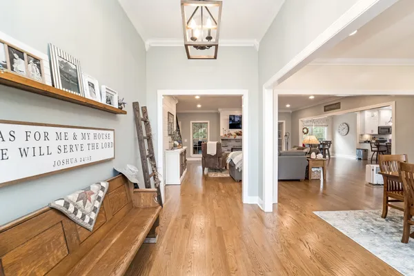 a view of a living room and kitchen