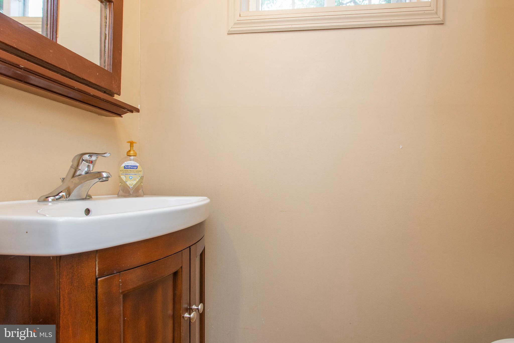 508 Exton Road Hatboro, PA 19040 - Photo 11 of 36 a bathroom with a sink and a mirror