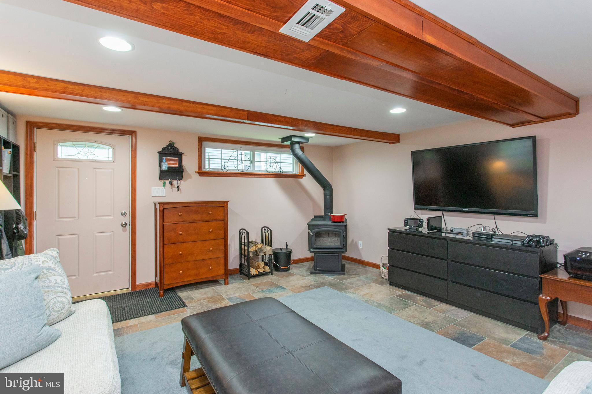 508 Exton Road Hatboro, PA 19040 - Photo 13 of 36 a living room with furniture and a flat screen tv