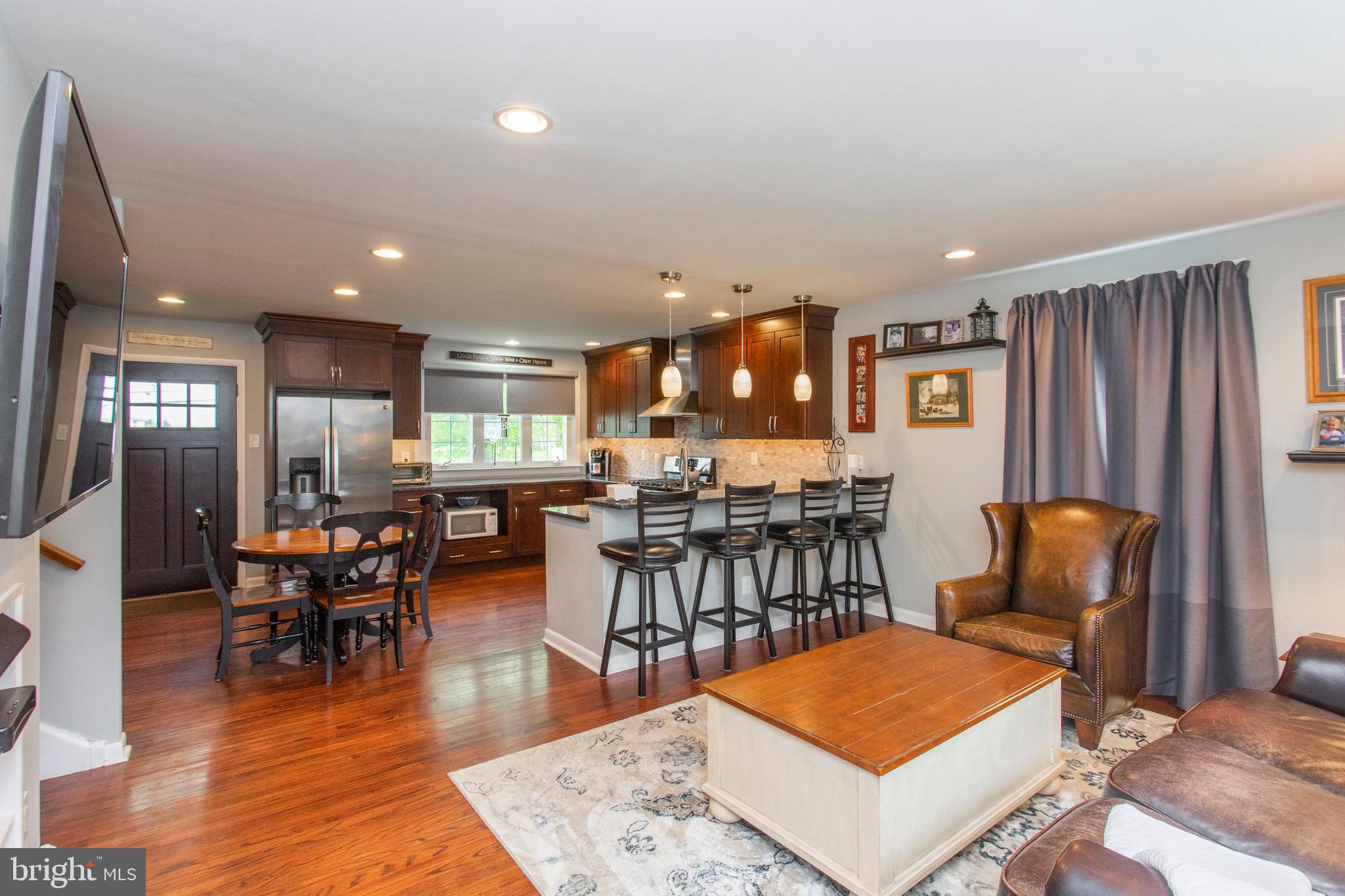 508 Exton Road Hatboro, PA 19040 - Photo 15 of 36 a living room with furniture a wooden floor and next to a window