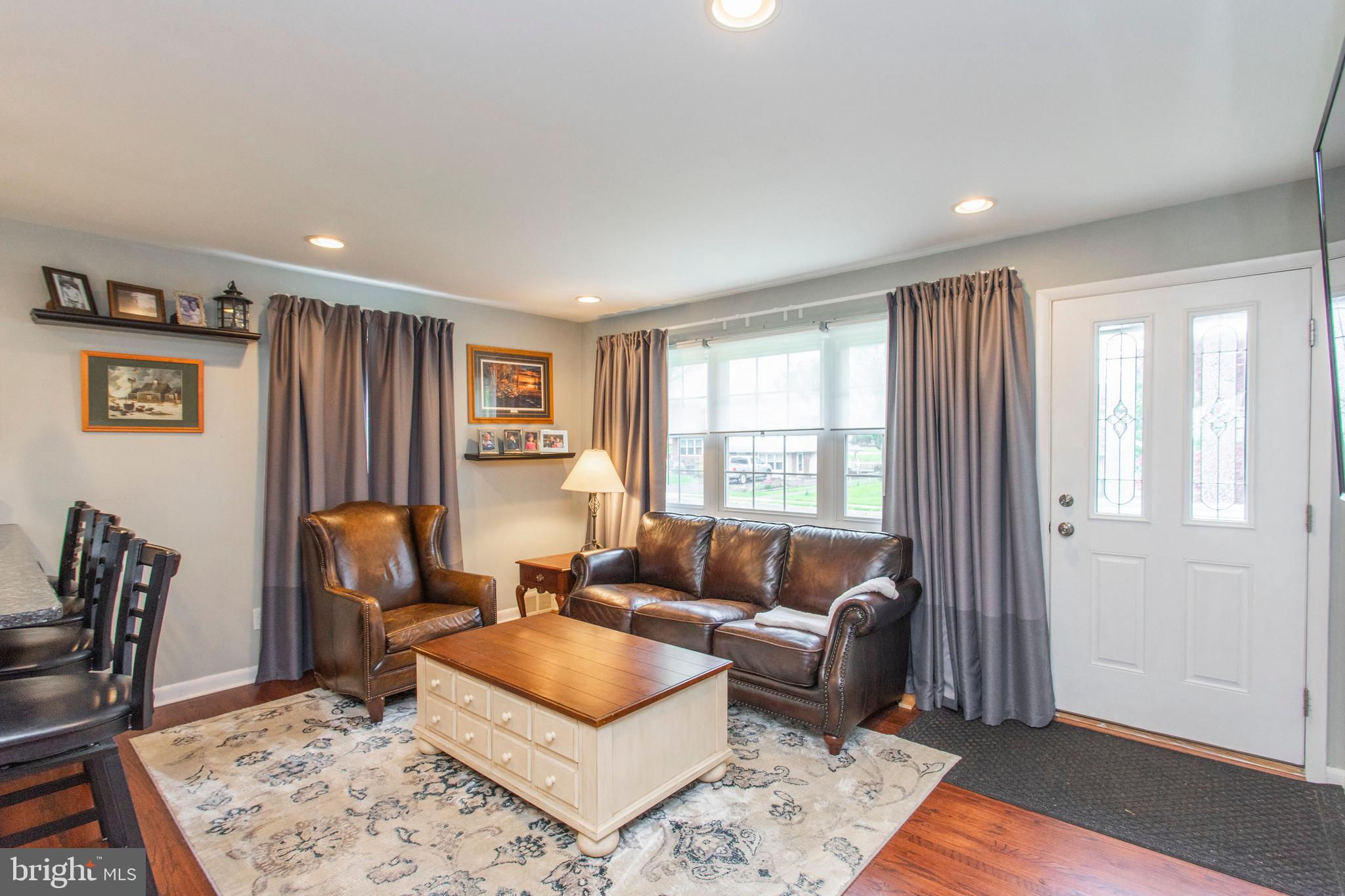 508 Exton Road Hatboro, PA 19040 - Photo 18 of 36 a living room with furniture and a window