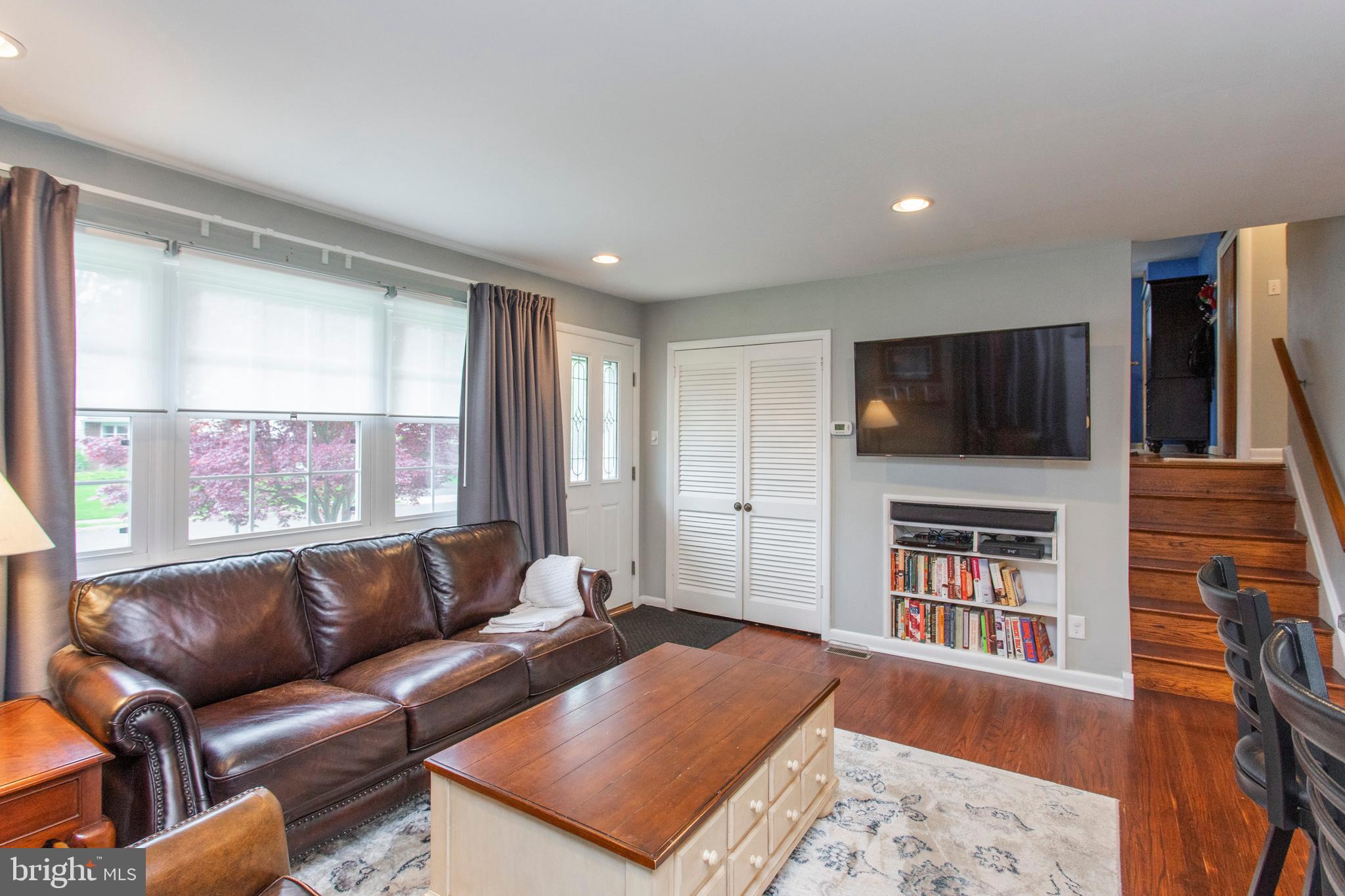 508 Exton Road Hatboro, PA 19040 - Photo 19 of 36 a living room with furniture and a flat screen tv