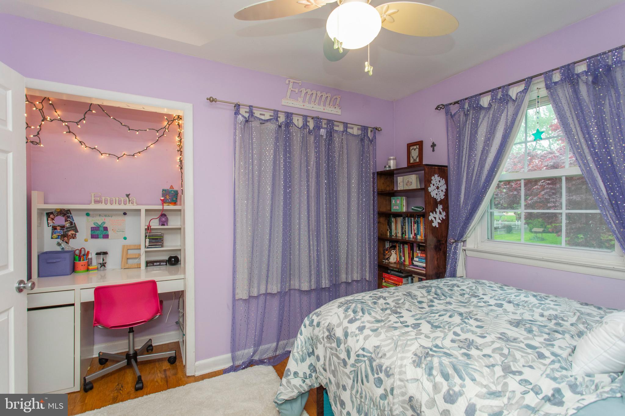 508 Exton Road Hatboro, PA 19040 - Photo 28 of 36 a bedroom with a bed a bookshelf and a window