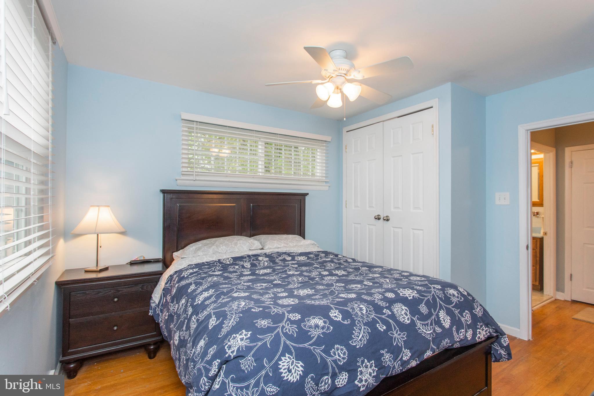 508 Exton Road Hatboro, PA 19040 - Photo 34 of 36 a bedroom with a bed and a chandelier
