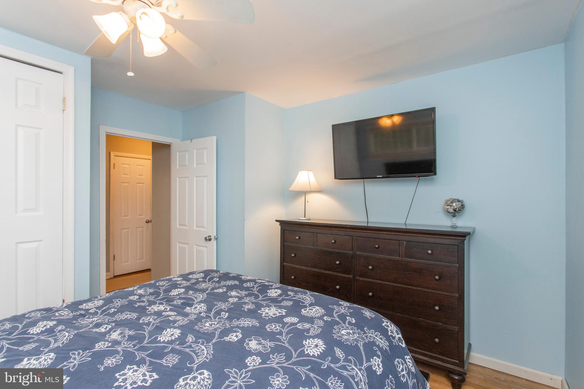 508 Exton Road Hatboro, PA 19040 - Photo 35 of 36 a bedroom with a bed and a flat screen tv