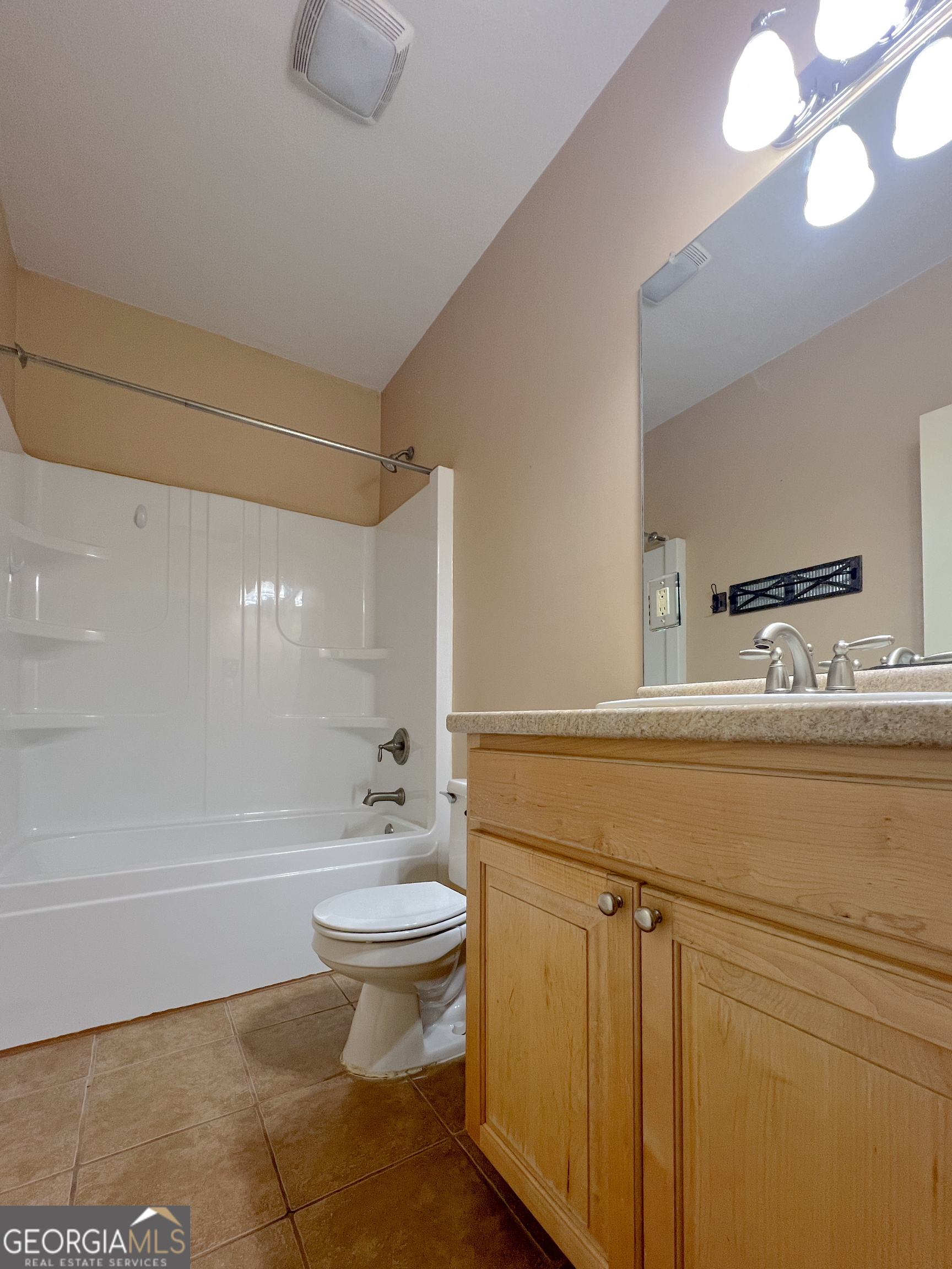 1610 Clifton Road Statesboro, GA 30458 - Photo 20 of 37 a bathroom with a sink a toilet and shower