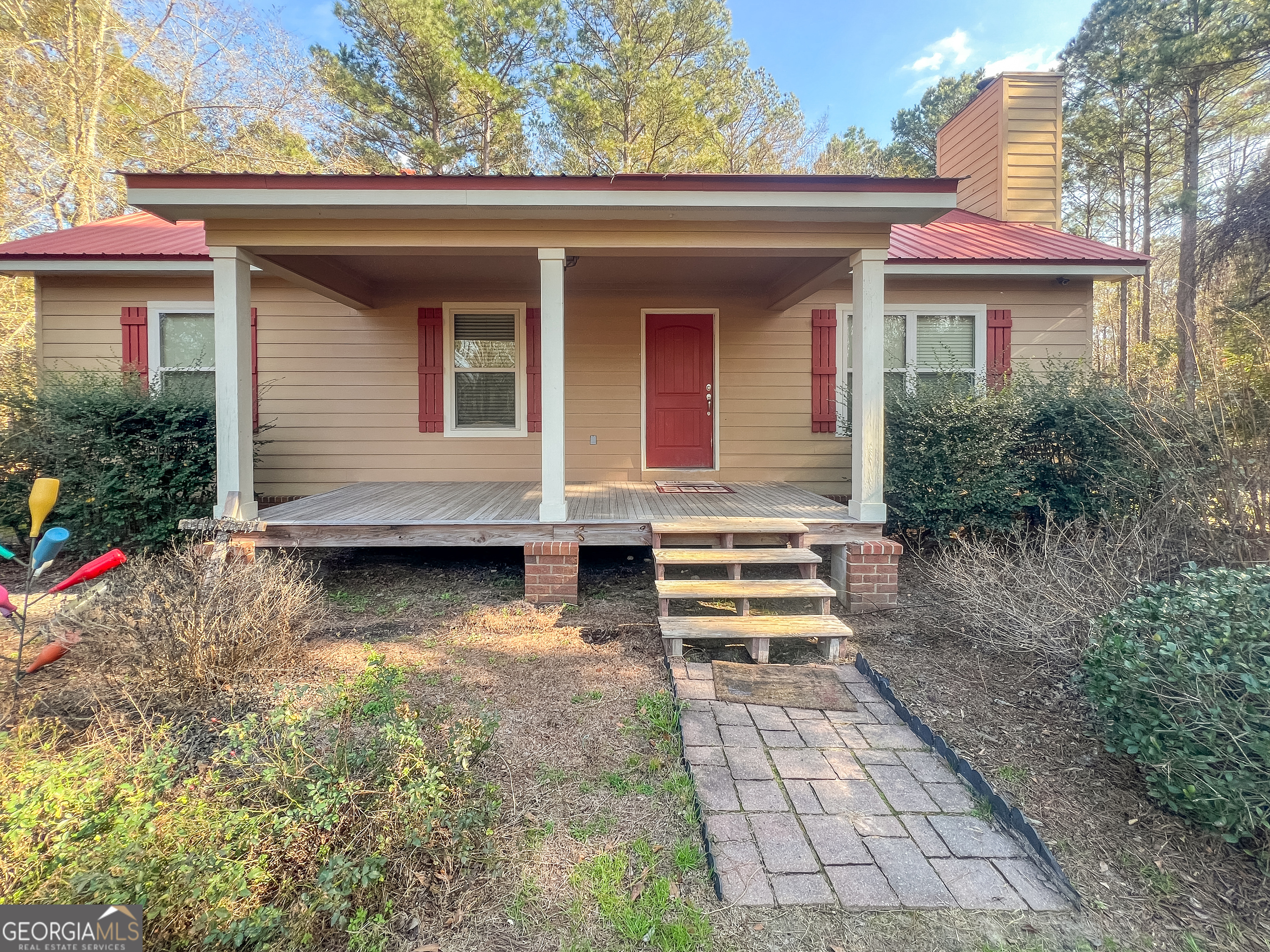 1610 Clifton Road Statesboro, GA 30458 - Photo 2 of 37 a view of house with outdoor seating