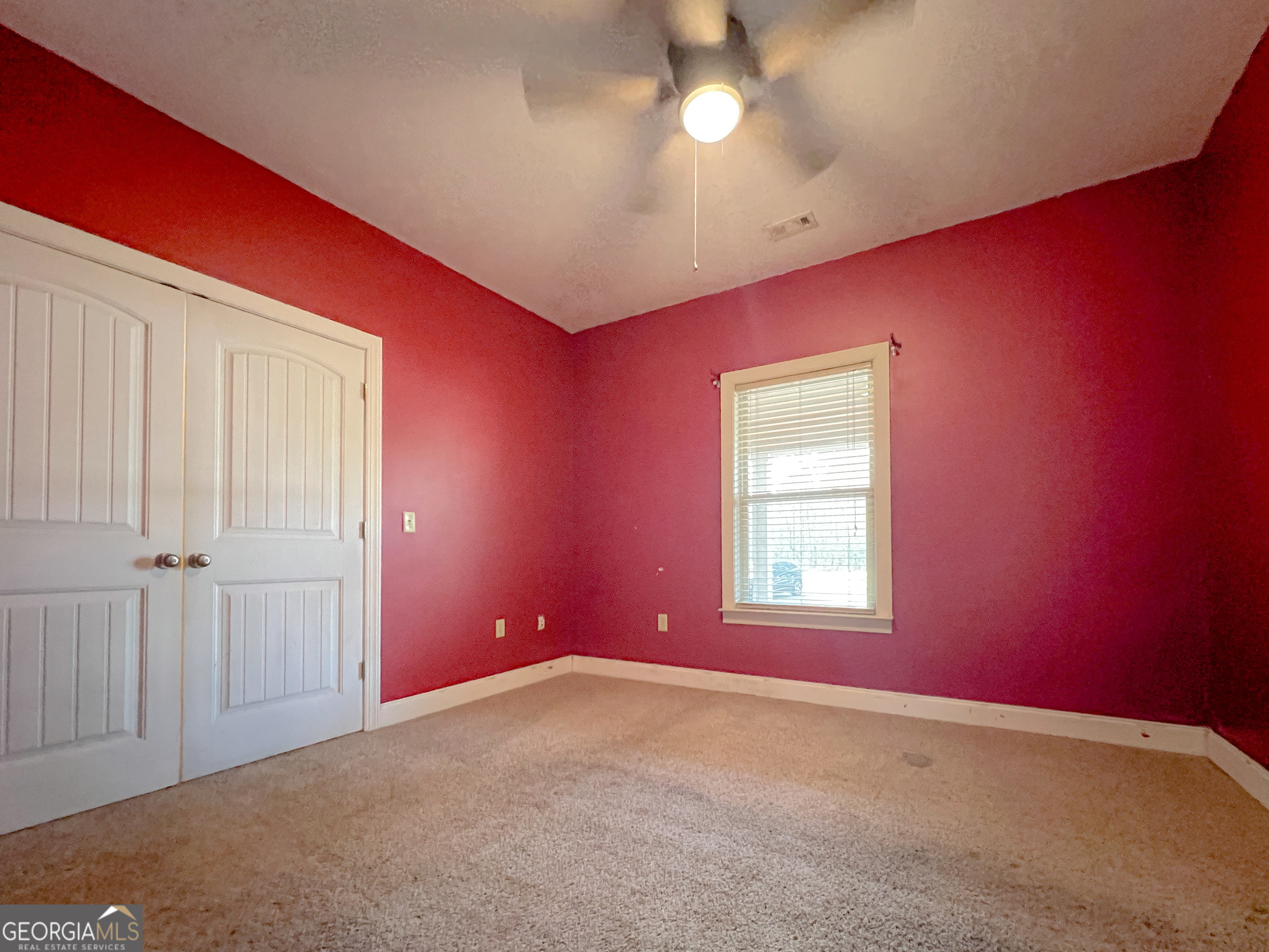 1610 Clifton Road Statesboro, GA 30458 - Photo 21 of 37 an empty room with windows and closet