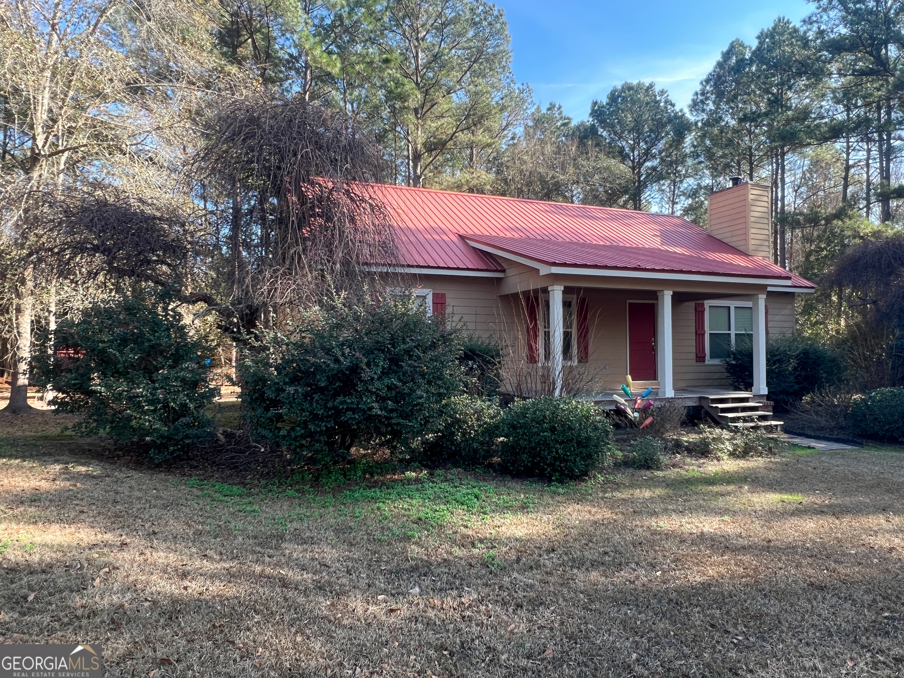 1610 Clifton Road Statesboro, GA 30458 - Photo 3 of 37 a view of a house with a yard plants and large tree