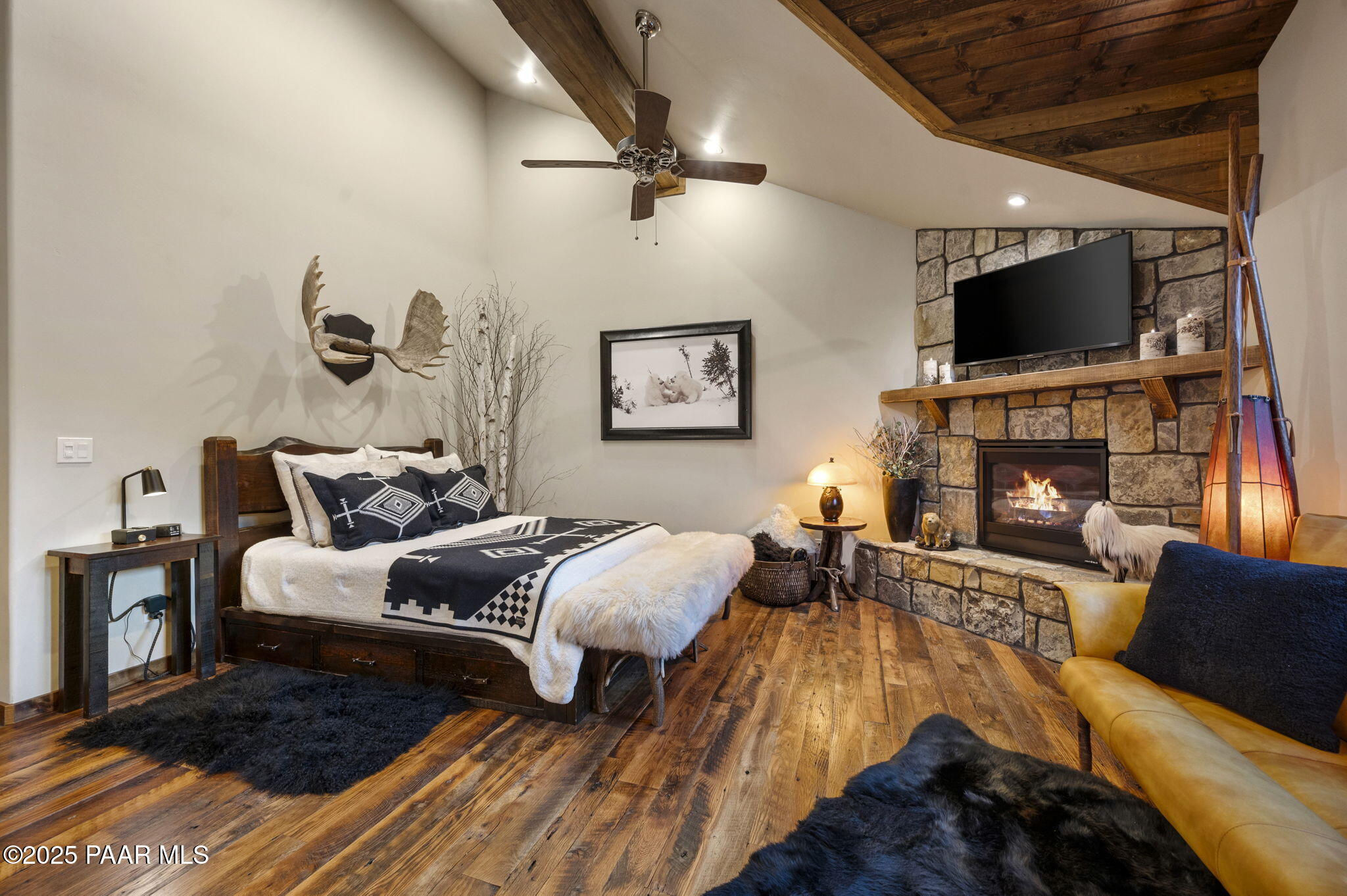 7520 North Williamson Valley Road Prescott, AZ 86305 - Photo 11 of 57 a bed room with bed and a flat screen tv