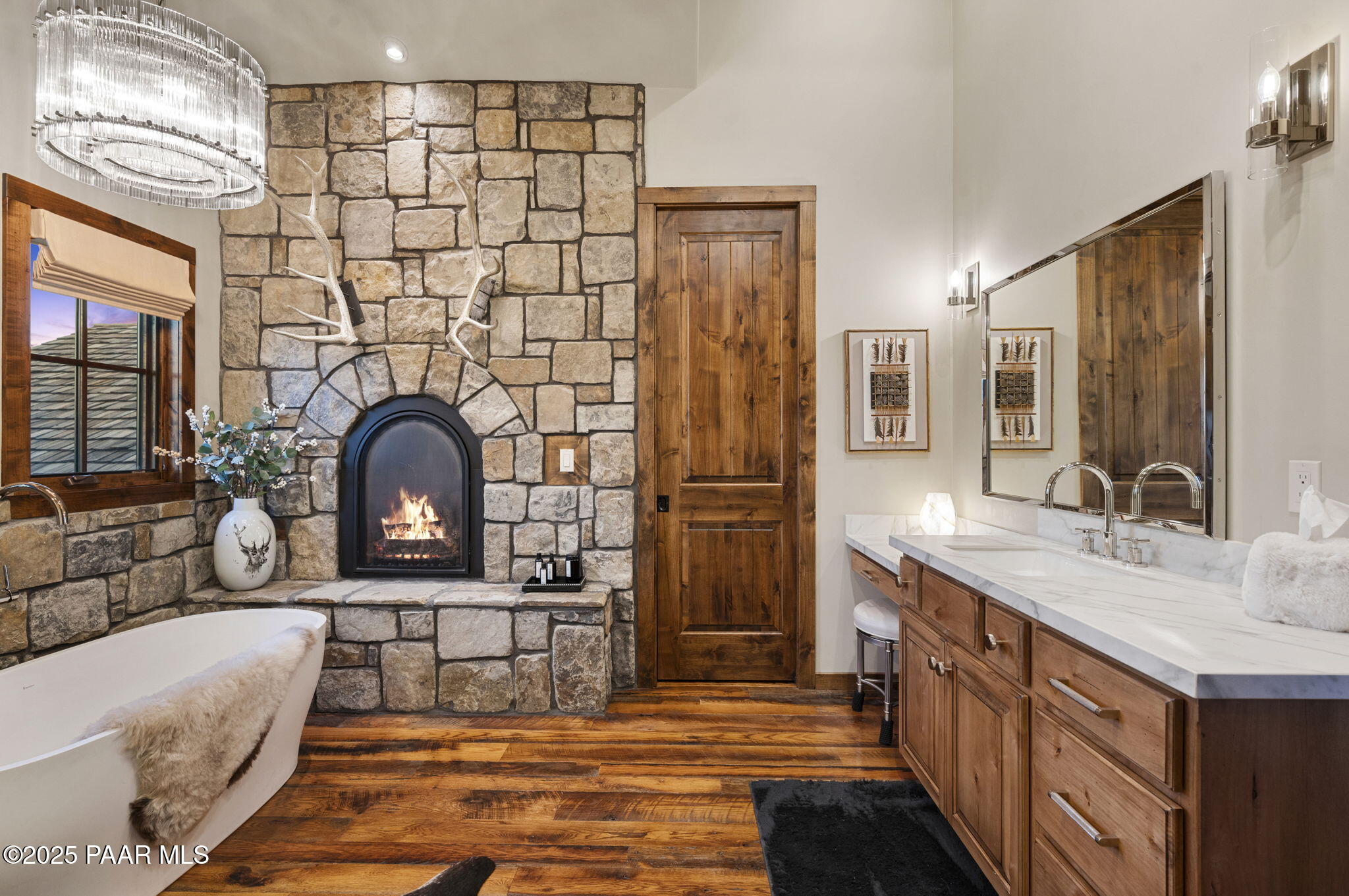 7520 North Williamson Valley Road Prescott, AZ 86305 - Photo 14 of 57 a living room with stainless steel appliances furniture a rug and a fireplace
