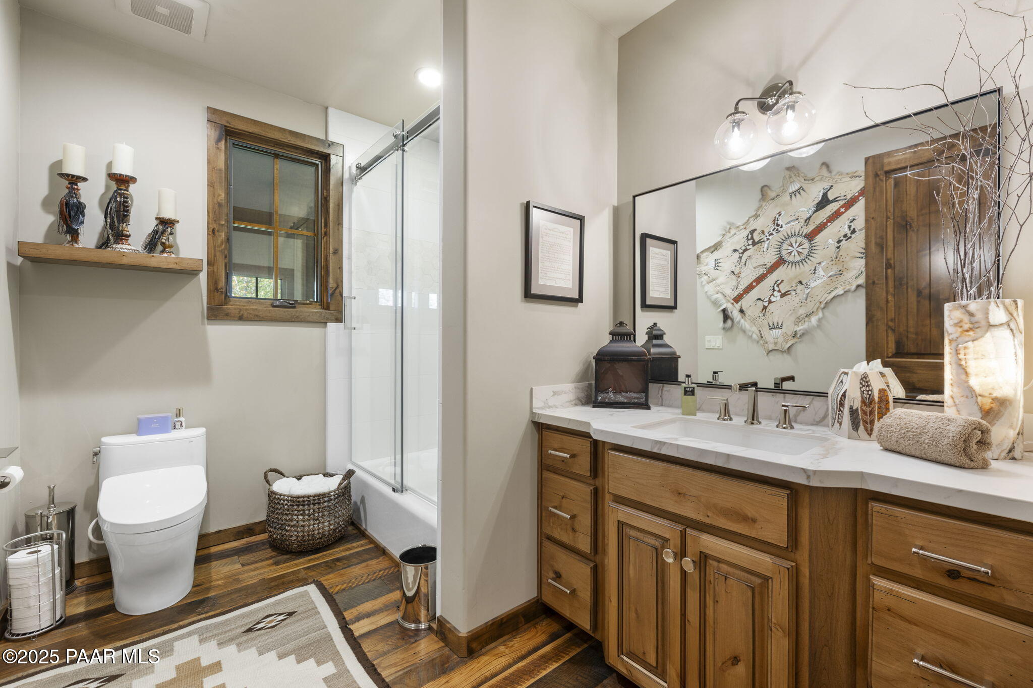 7520 North Williamson Valley Road Prescott, AZ 86305 - Photo 19 of 57 a bathroom with a granite countertop sink toilet and mirror