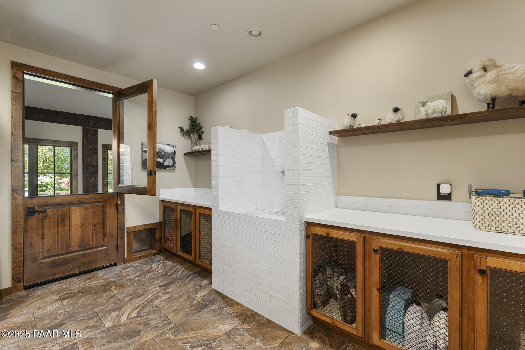 7520 North Williamson Valley Road Prescott, AZ 86305 - Photo 21 of 57 a utility room with cabinets and washer