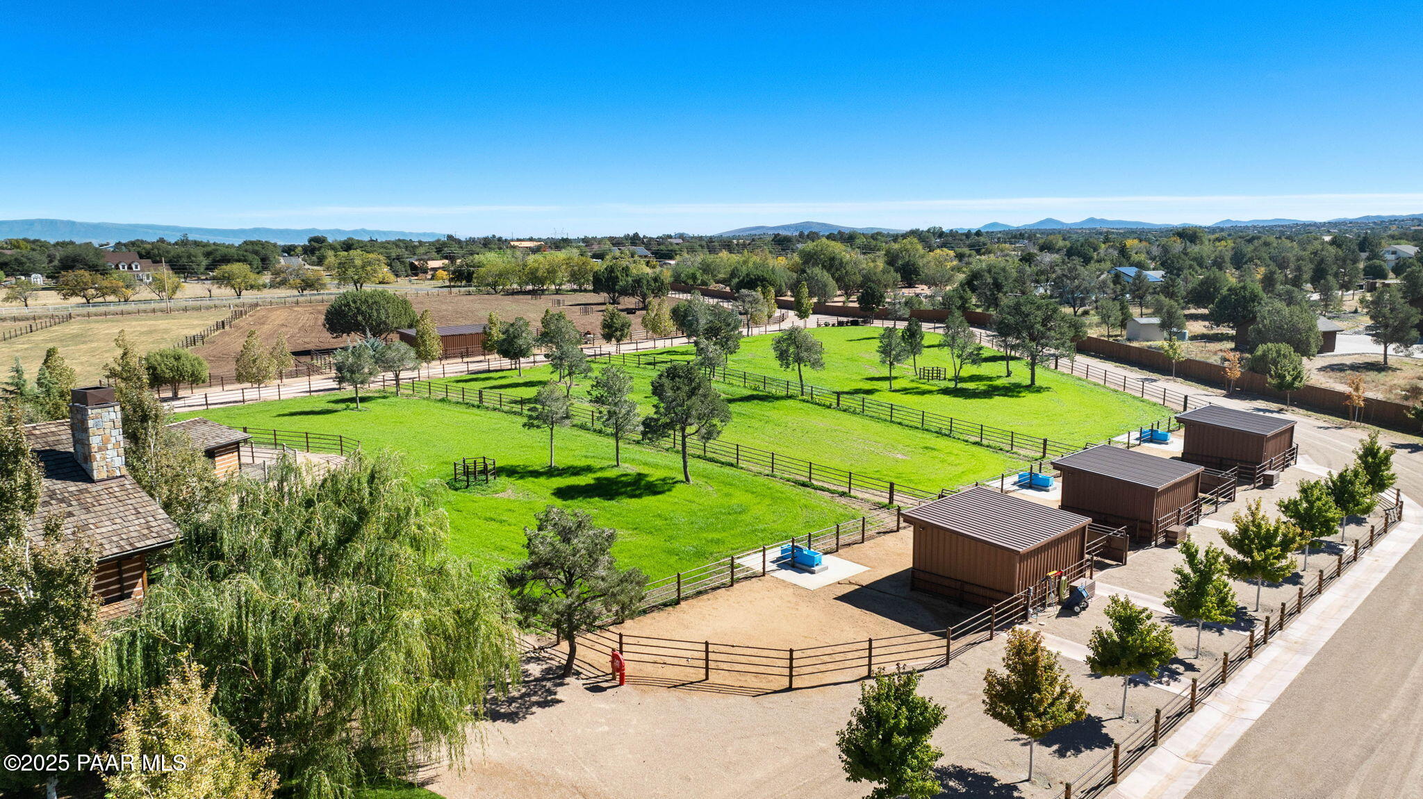 7520 North Williamson Valley Road Prescott, AZ 86305 - Photo 50 of 57 an aerial view of a house with garden space and ocean view in back