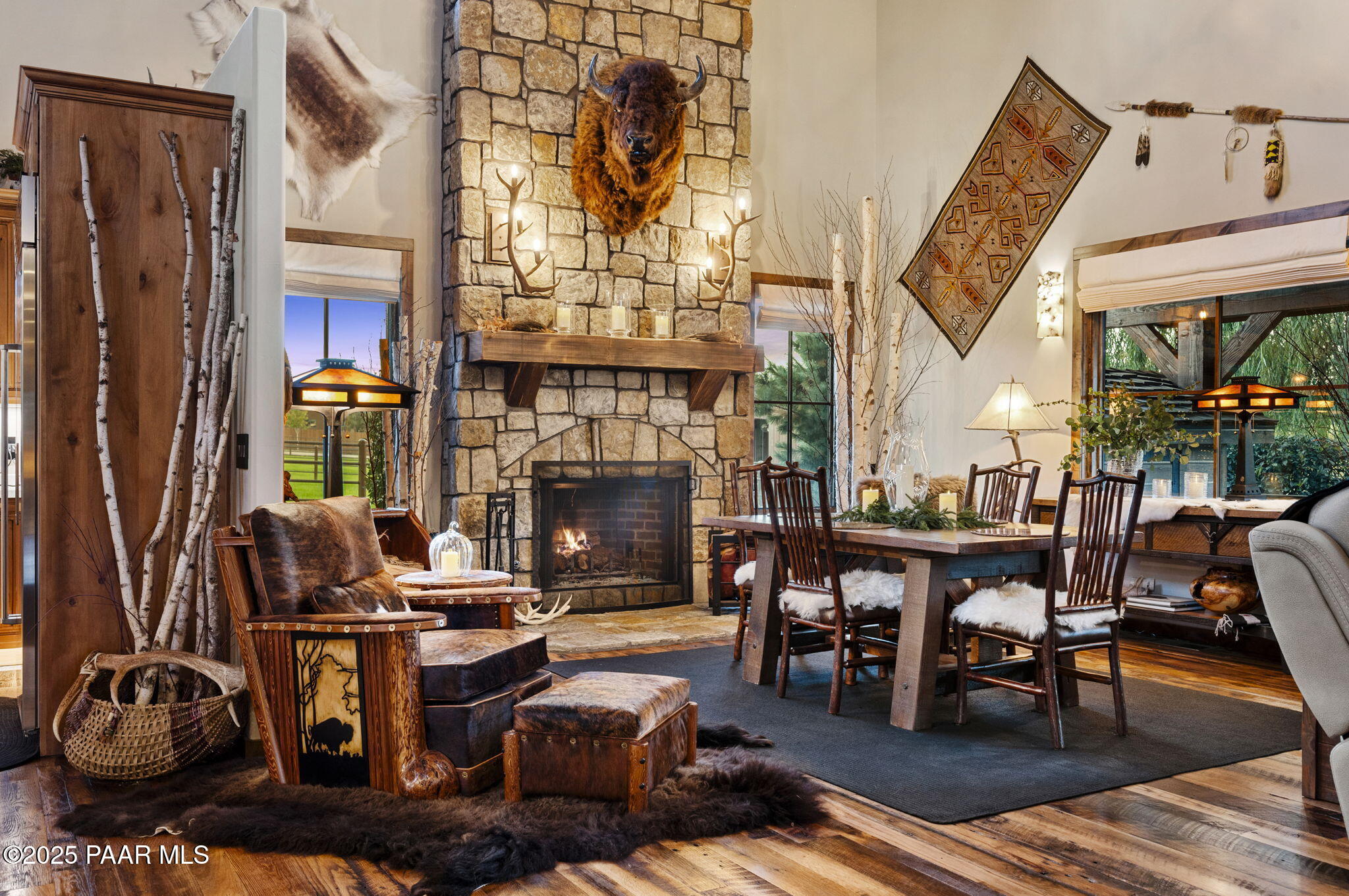 7520 North Williamson Valley Road Prescott, AZ 86305 - Photo 7 of 57 a living room with furniture a fireplace and a table