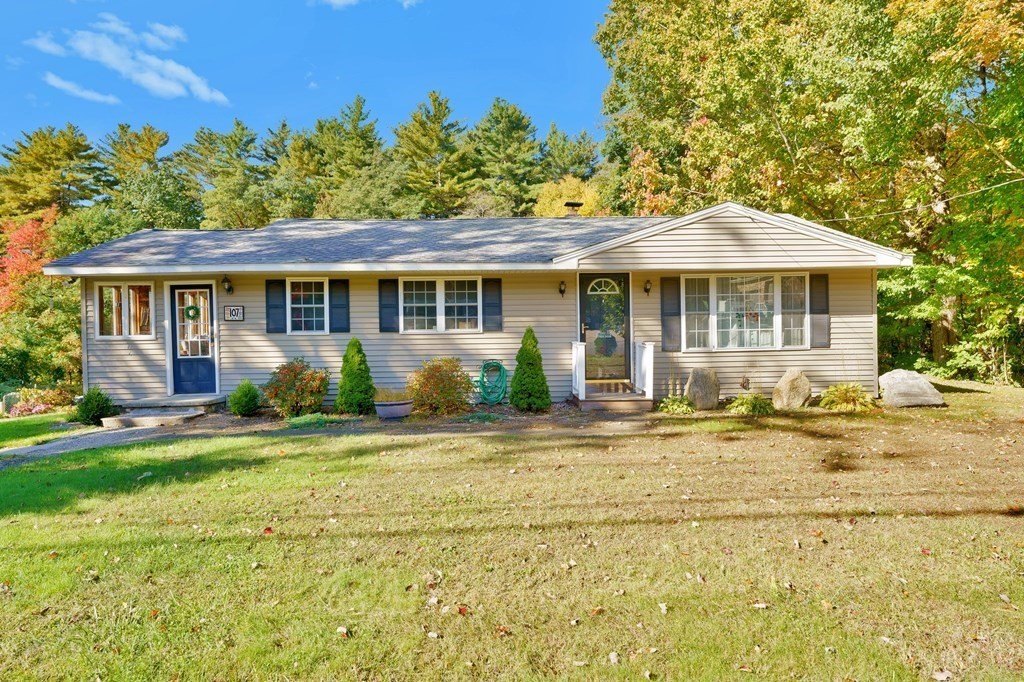 107 Brookfield Road Sturbridge, MA 01518 - Photo 1 of 36 a front view of a house with a garden