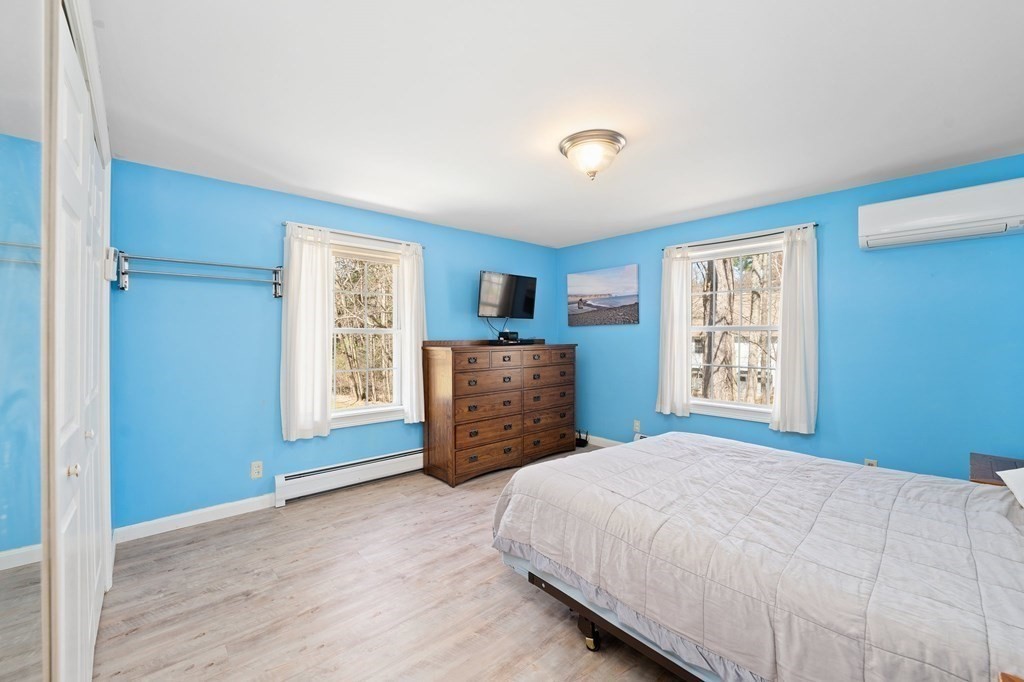 107 Brookfield Road Sturbridge, MA 01518 - Photo 11 of 36 a bedroom with a bed dresser and a window