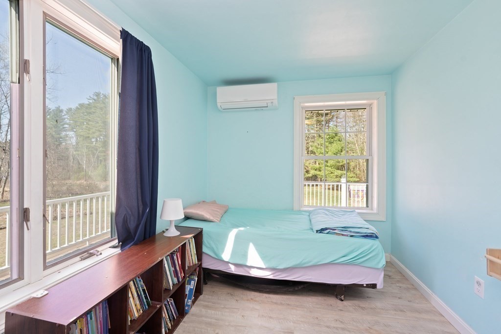 107 Brookfield Road Sturbridge, MA 01518 - Photo 18 of 36 a bedroom with a bed and a window