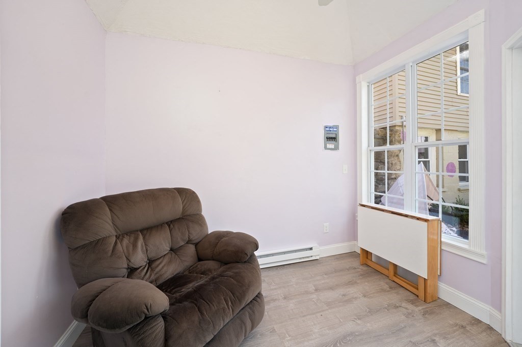 107 Brookfield Road Sturbridge, MA 01518 - Photo 31 of 36 a living room with furniture and a window