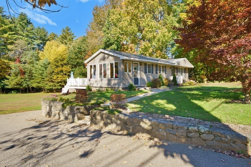 107 Brookfield Road Sturbridge, MA 01518 - Photo 33 of 36 a front view of a house with yard and green space