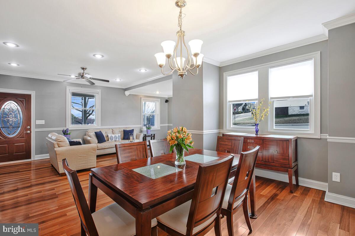 201 Charles Road Linthicum Heights, MD 21090 - Photo 11 of 50 a view of a dining room with furniture window and wooden floor