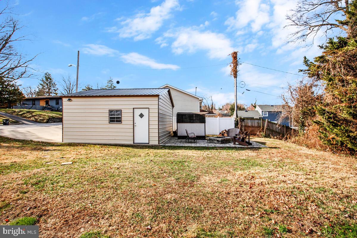 201 Charles Road Linthicum Heights, MD 21090 - Photo 39 of 50 Paver patio with an awesome fire pit