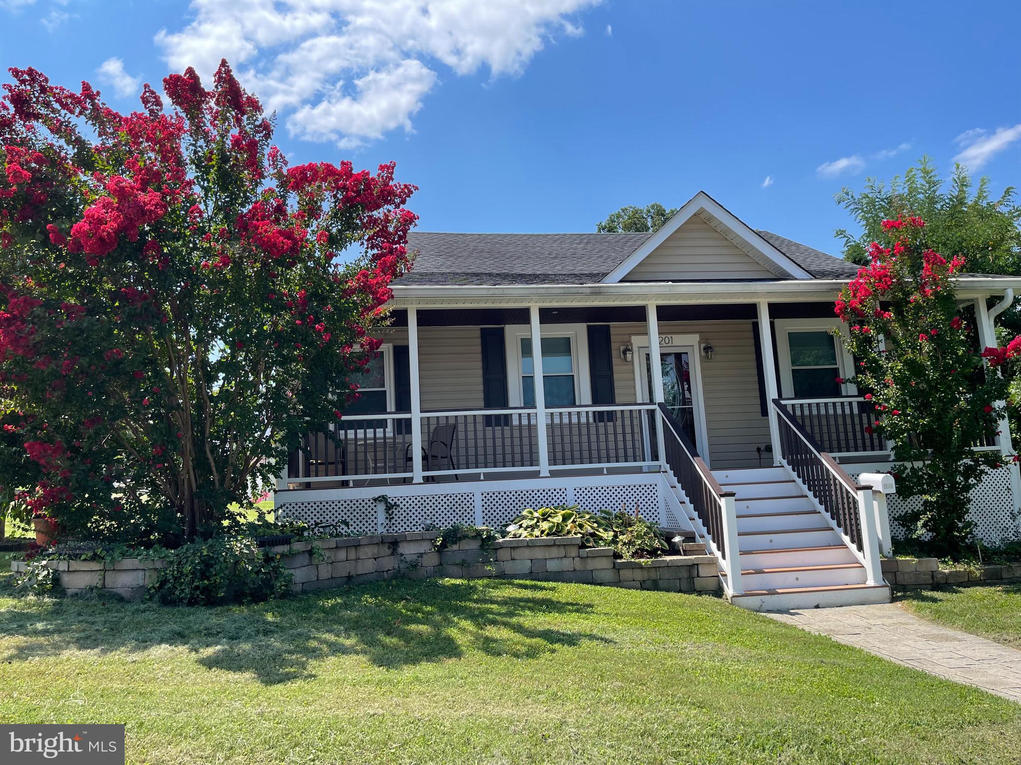 201 Charles Road Linthicum Heights, MD 21090 - Photo 45 of 50 a front view of a house with a garden